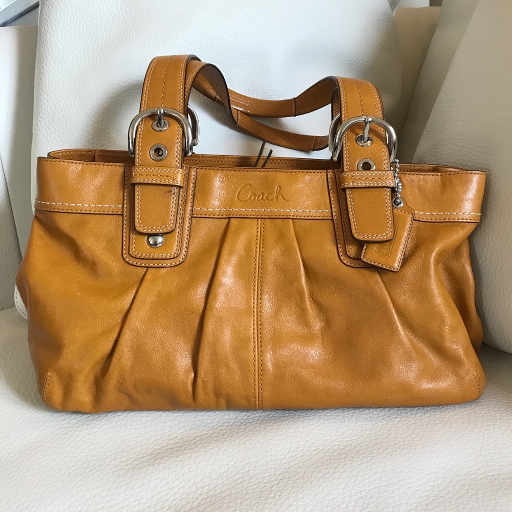 ***SOLD***Authentic Coach. Tan/orange leather.